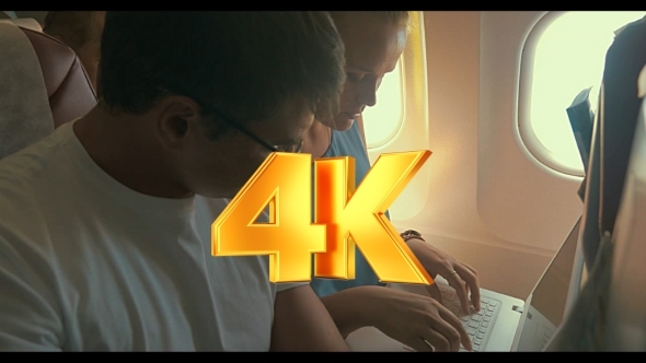 Young People Working With Laptop In Plane Young People Working With Laptop In Plane