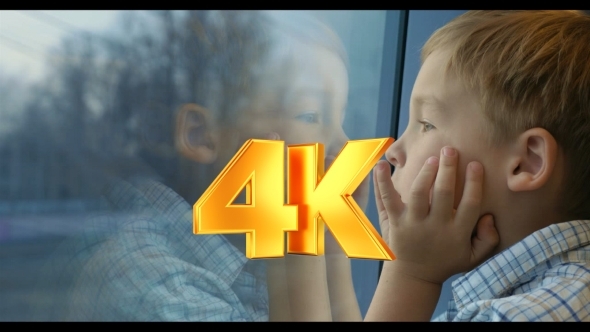 Boy Looking Out The Train Window With Hands On The Boy Looking Out The Train Window With Hands On The