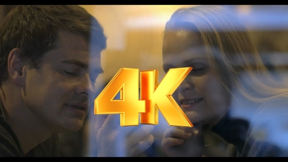 Young People Looking Through The Photos On Cell alt