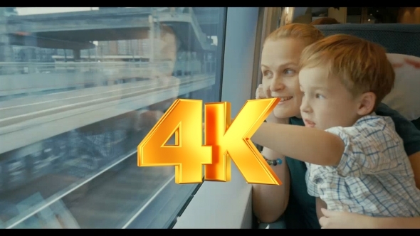 Mother And Son Traveling Across The City By Train Mother And Son Traveling Across The City By Train