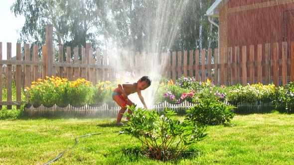 Boy plays with water 