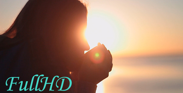 Woman Drinking A Hot Drink At Dawn Woman Drinking A Hot Drink At Dawn