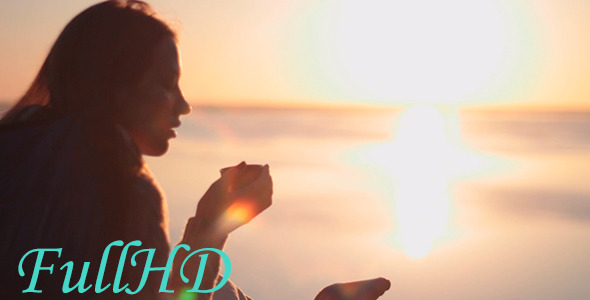 Woman Drinking A Hot Drink At Dawn Woman Drinking A Hot Drink At Dawn