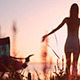 Woman Stands At Sunrise Woman Stands At Sunrise - VideoHive Item for Sale