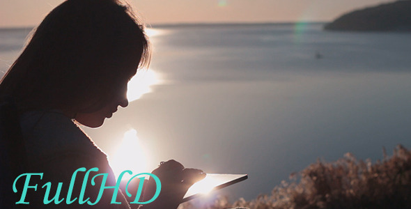 Girl Using Tablet at Dawn Girl Using Tablet at Dawn