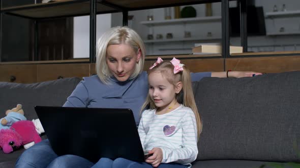 Caring Mother Educating Cute Preschool Girl Online alt