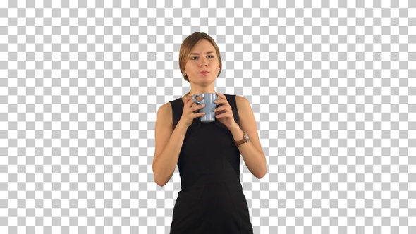 Young beautiful woman holding cup of tea or coffee, Alpha Channel