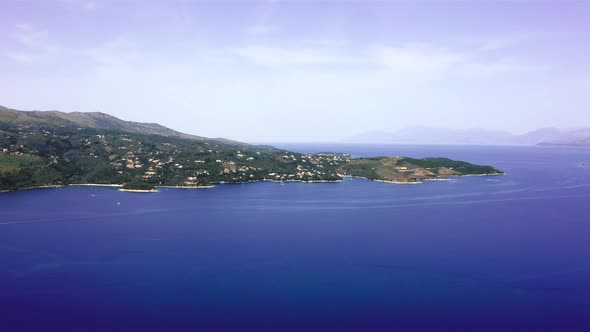 Corfu island mediterranean blue coast in sunny day. Aerial view alt