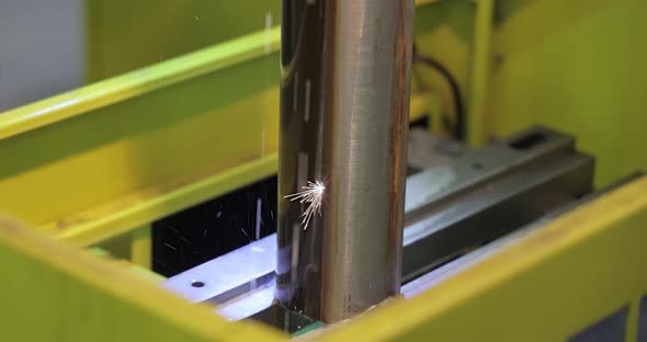 EDM CNC Machine While Cutting the Sample Work Pieces alt