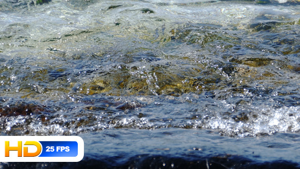 Small Waves Hitting on Rock Small Waves Hitting on Rock
