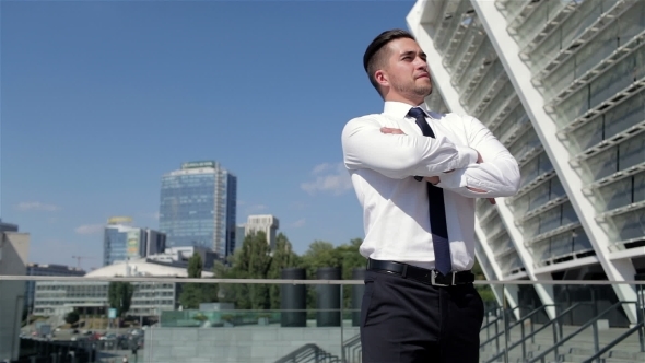 Handsome Young Man Standing Outdoors Handsome Young Man Standing Outdoors