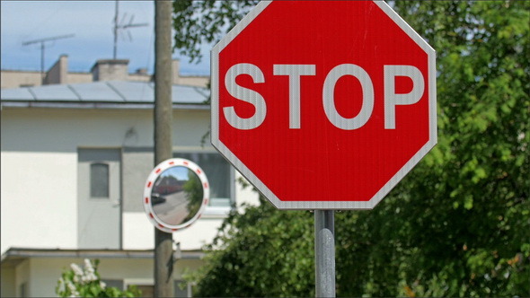 A Stop Signage on the Side of the Road