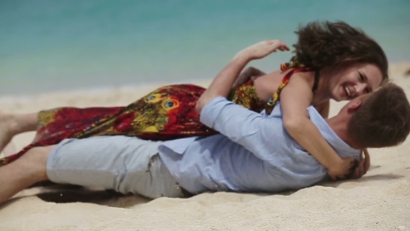 Lovers Lying Down On The Beach Lovers Lying Down On The Beach
