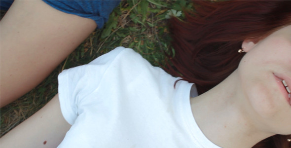A Girl and a Boy lying on the Grass A Girl and a Boy lying on the Grass