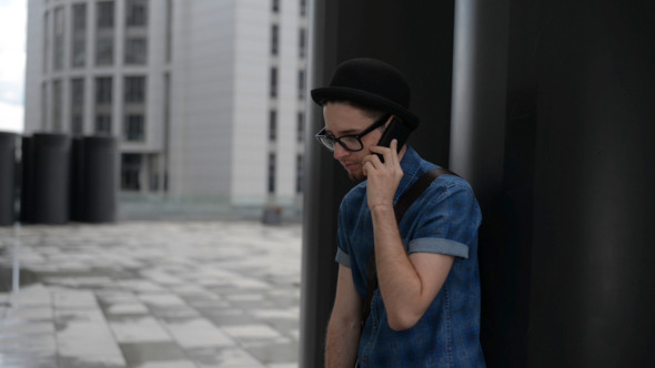 Young Man Talking on Phone Young Man Talking on Phone