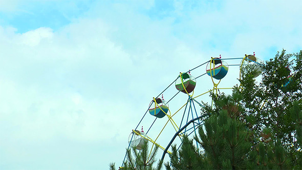 Ferris Wheel on the Background Moving Clouds Ferris Wheel on the Background Moving Clouds