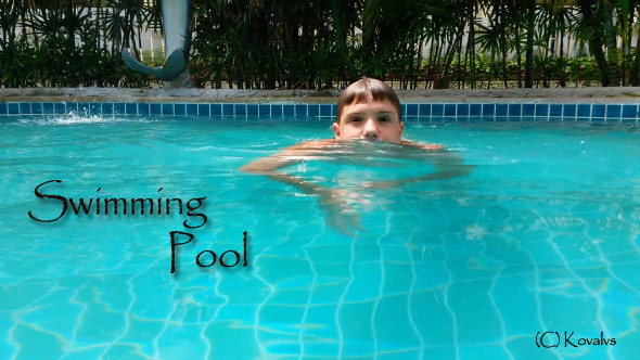 Boy In Swimming Pool