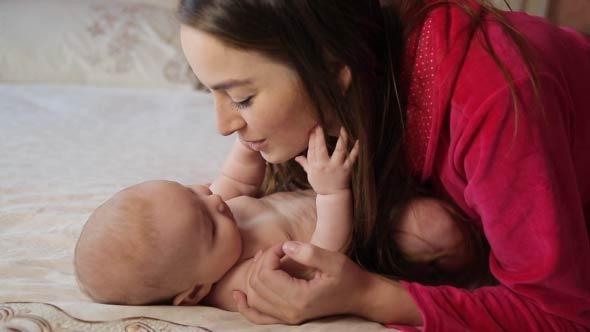 Mother Kissing Baby Mother Kissing Baby