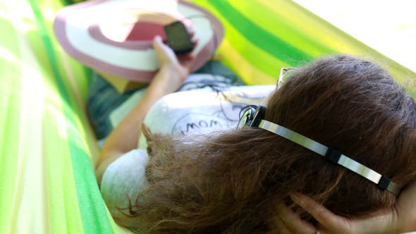 Woman Listening to Music on Headphones Woman Listening to Music on Headphones