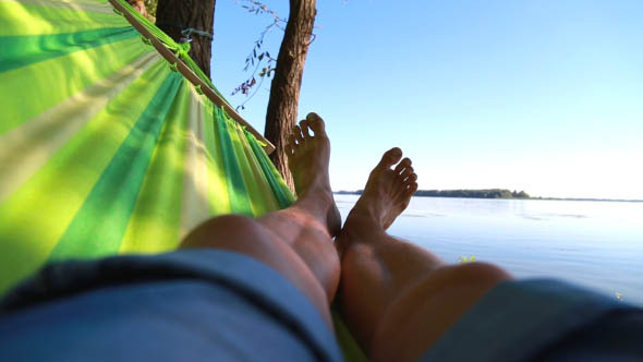 Man in a Hammock on the Beach Man in a Hammock on the Beach