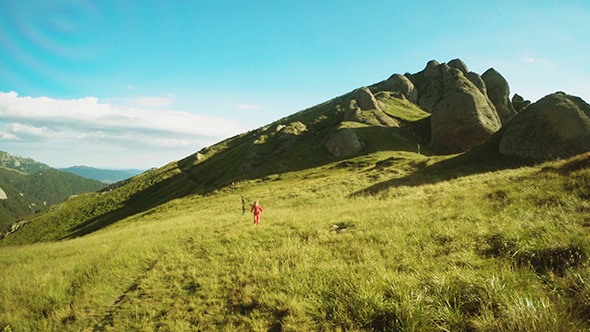 Girl Walking Through Mountains Girl Walking Through Mountains