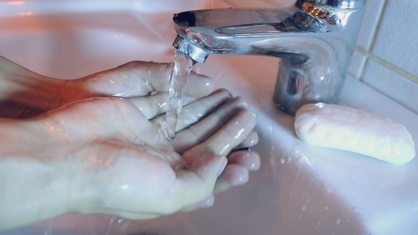 Washing Of Hands With Soap Under Running Water