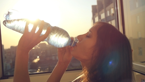 Attractive Woman Drinking Water
