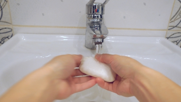 Washing Of Hands With Soap Under Running Water
