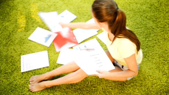 Girl Collecting Papers Girl Collecting Papers