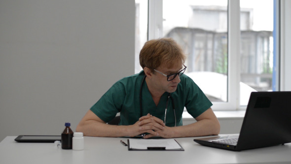 Doctor Reading Medical Data Doctor Reading Medical Data
