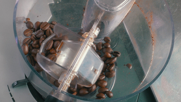 Coffee Beans Added to the Grinder Coffee Beans Added to the Grinder