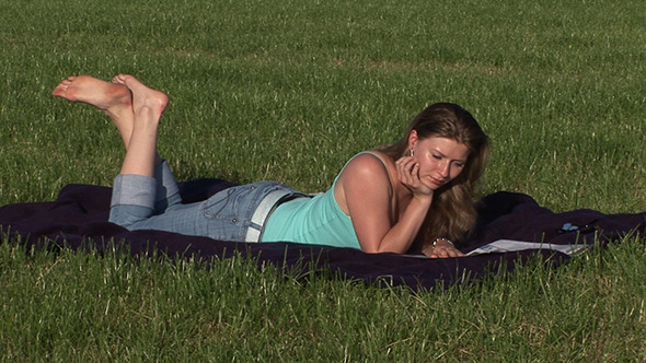 Woman Reading Magazine Outdoors Woman Reading Magazine Outdoors