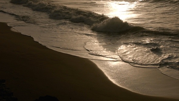 Sea Waves On Sand Beach