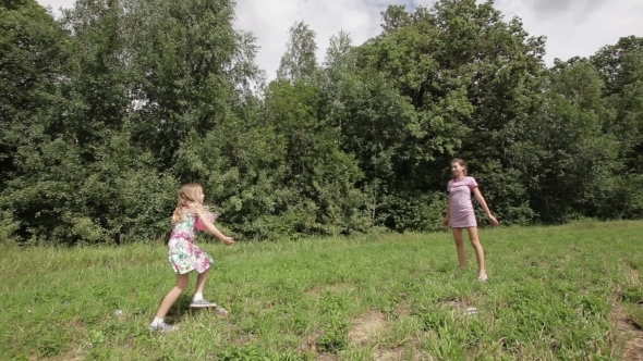Two Girls Playing With The Ball Two Girls Playing With The Ball