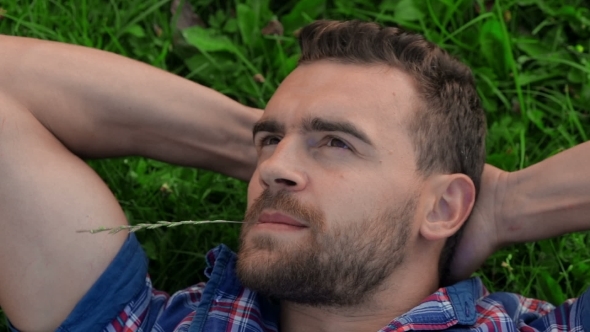 Adult Man Resting On The Field Adult Man Resting On The Field