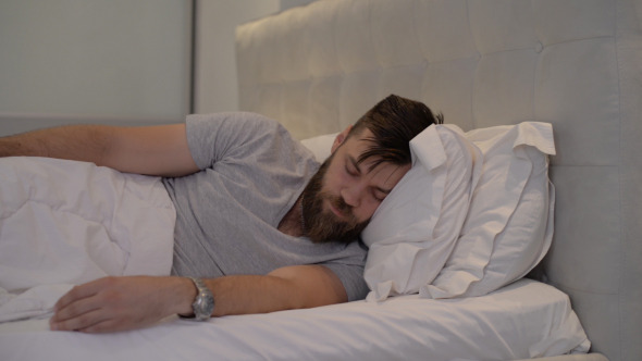 Man Disturbed while Sleeping Man Disturbed while Sleeping