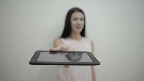 Girl Giving Tablet to Share Information Girl Giving Tablet to Share Information