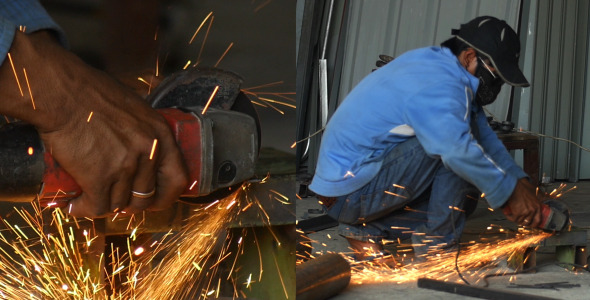Worker Cuts Metal Worker Cuts Metal