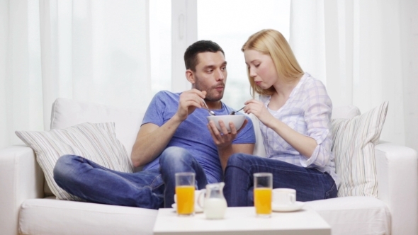 Happy Couple Having Breakfast At Home Happy Couple Having Breakfast At Home