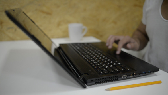 Casual Businessman Using Laptop Casual Businessman Using Laptop