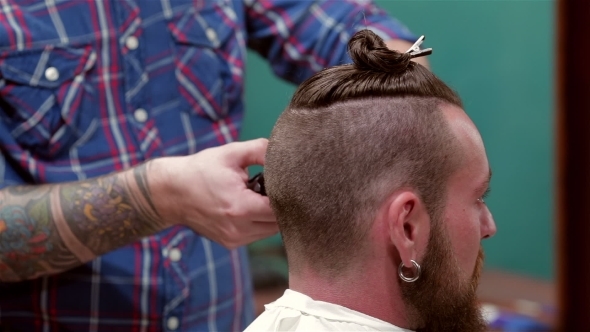 Beard Barber Making Haircut To Hipster Client Beard Barber Making Haircut To Hipster Client