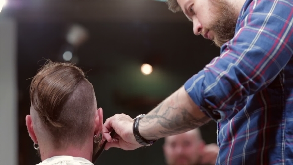 Beard Barber Making Haircut To Hipster Client Beard Barber Making Haircut To Hipster Client