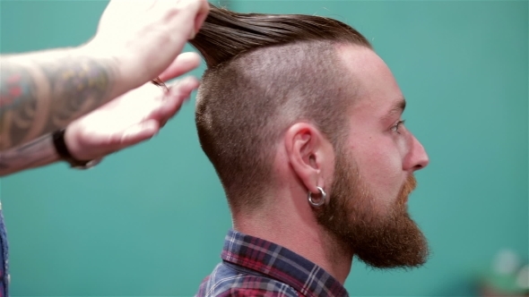 Beard Barber Making Haircut To Hipster Client Beard Barber Making Haircut To Hipster Client