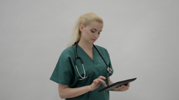 Doctor Working on Tablet PC Doctor Working on Tablet PC