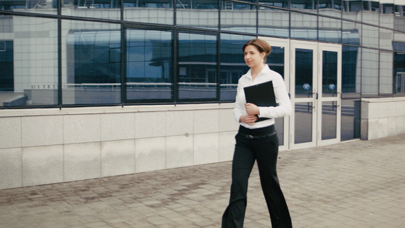  Young Business Woman Walking On The Street