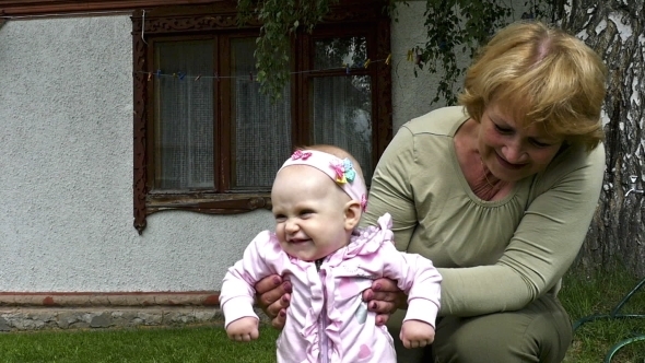 Grandmother Plays With Granddaughter Grandmother Plays With Granddaughter