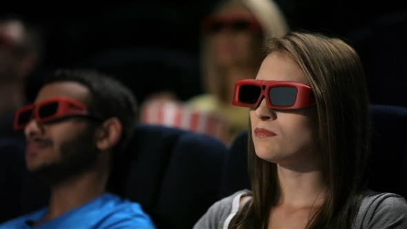 Group Of Friends Watching Film In Cinema Group Of Friends Watching Film In Cinema
