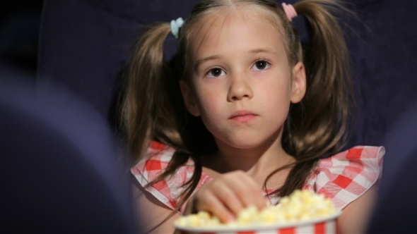 Beautiful Little Girl Waching Movie In The Cinema Beautiful Little Girl Waching Movie In The Cinema
