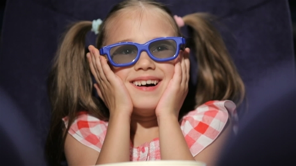 Beautiful Little Girl Waching Movie In The Cinema Beautiful Little Girl Waching Movie In The Cinema