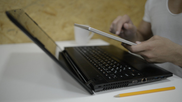 Casual Businessman Using Tablet Casual Businessman Using Tablet